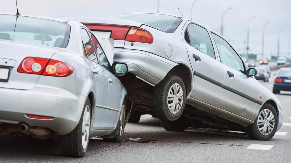 A car crash between two silver sedans represented by Gillani Law in Center Point, Alabama