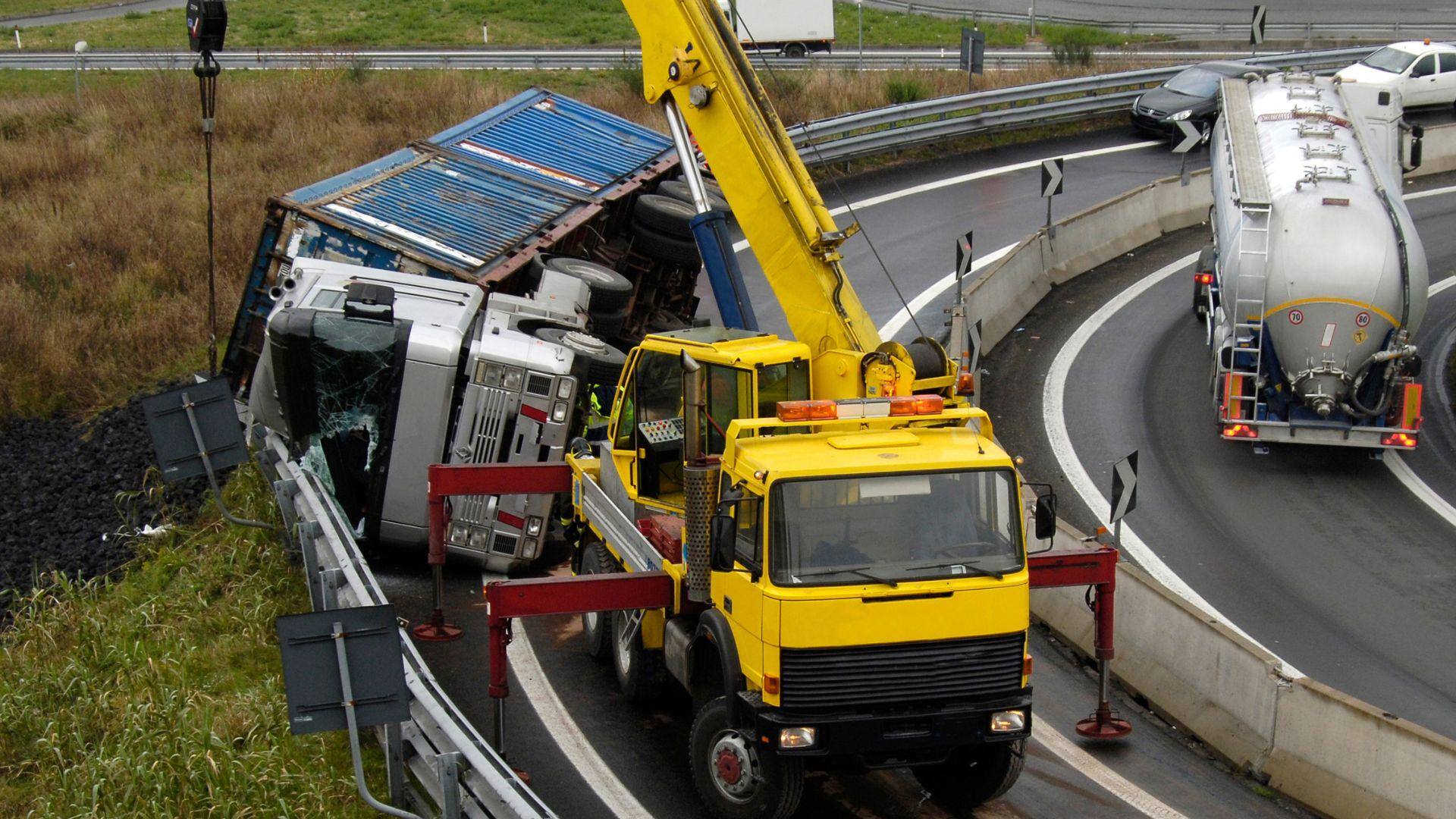 Removing a truck from an accident scene in Alabaster, Alabama