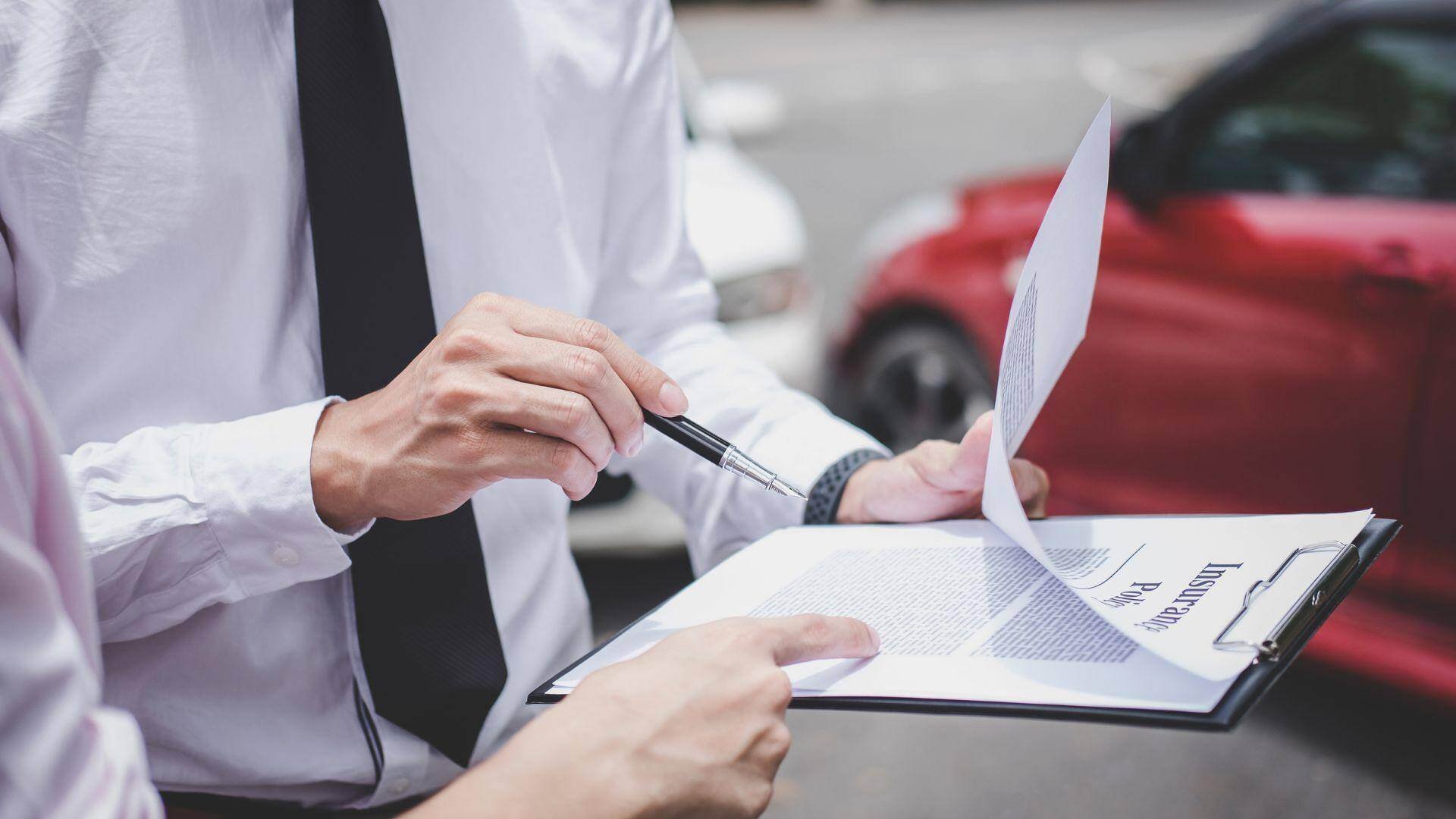 An insurance agent reviewing a case in Alexander City, Alabama