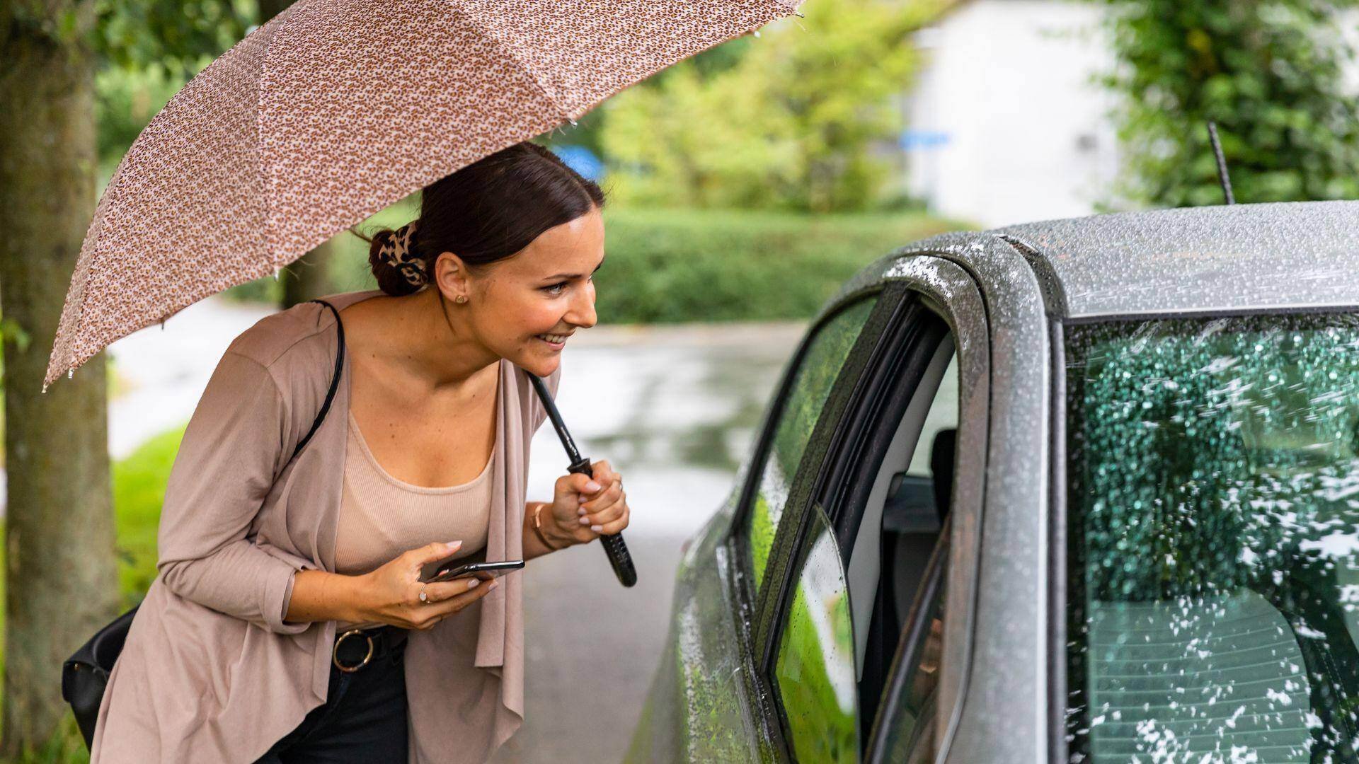 A lyft user meeting and getting into the car of the Lyft driver in Alabaster, Alabama